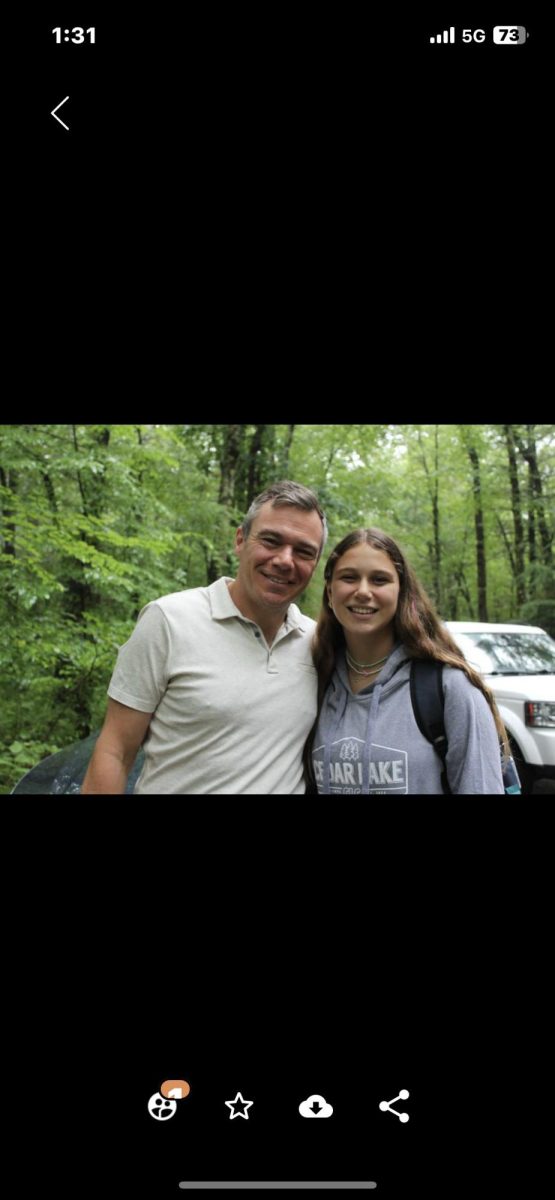 Eighth grader Abbie Schutman with her dad, Anthony, who dropped her off at Cedar Lake camp last summer. 