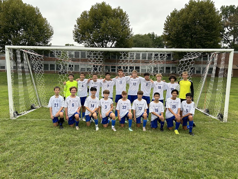 Media Specialist Mr. Andrew Cusumano coaches the WHS freshmen boys soccer team pictured here.