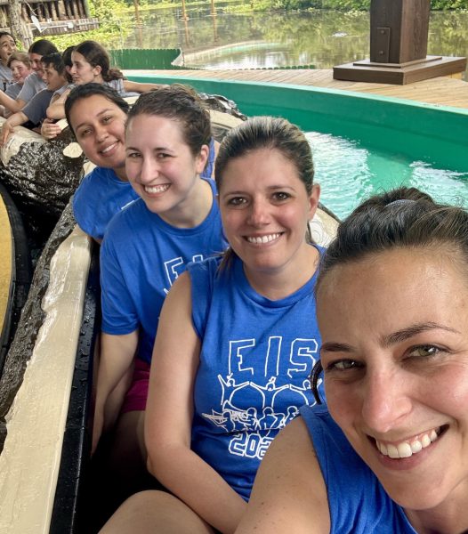EIS teachers Mrs. Amanda Gant, Ms. Jenn Dow, Mrs. Willa Thayer, and Ms. Stephanie Grajales riding the log flume at Six Flags this June during a music field trip. 