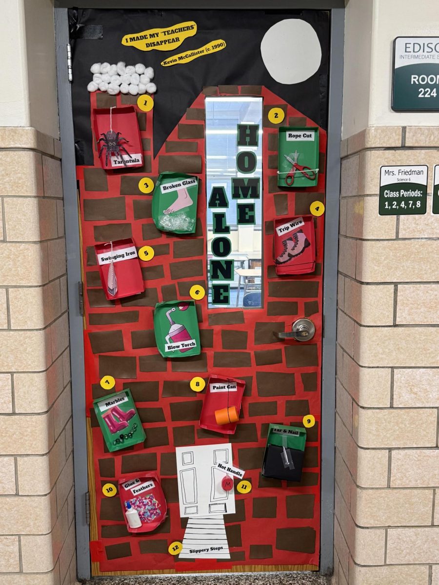 Mrs. Jessica Herrera's eighth grade lunch study won the door decorating contest by creating a riff on the popular holiday movie Home Alone. 