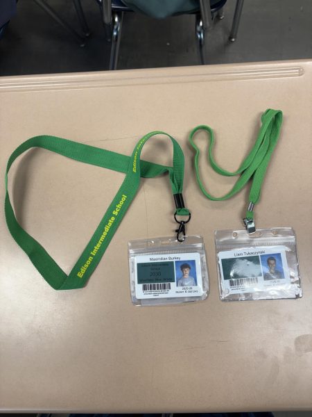 The EIS eighth grade lanyards seen here are causing some controversy in the school.