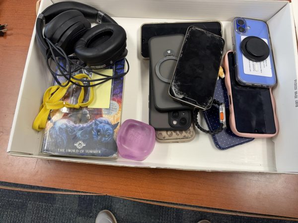 The main office at Edison Intermediate School has a box where confiscated cell phones wait for their owners to pick them up at the end of the school day. 