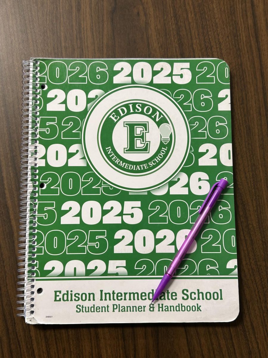 Sixth graders each get an EIS planner to help them transition smoothly into new classes and schedules at our school. 
