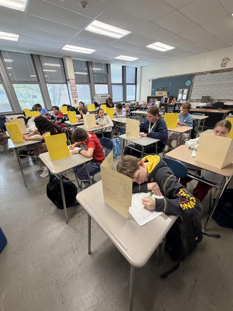 Here, students are seen taking a test in the classroom. Maybe if there were less tests in a week, students would feel better about stress levels. 